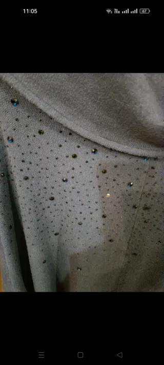 Poncho blu con perline