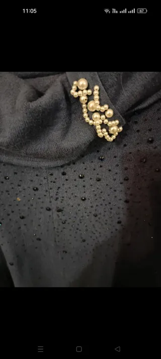 Poncho blu con perline