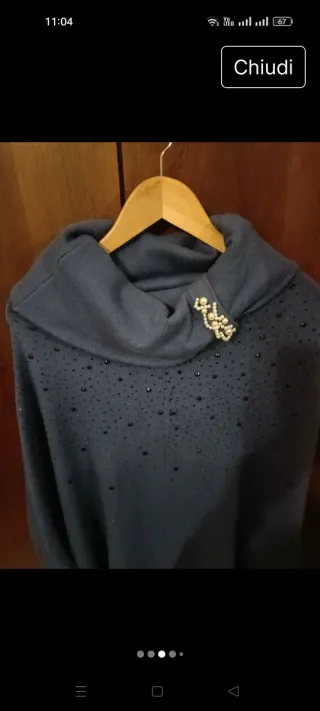 Poncho blu con perline
