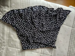 Falda-pantalon corta floral con volantes y lazada