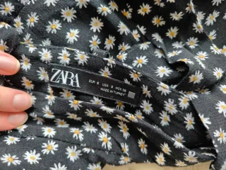 Falda-pantalon corta floral con volantes y lazada