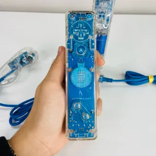 Coppia Controller nintendo Wii Afterglow +Nunchuck