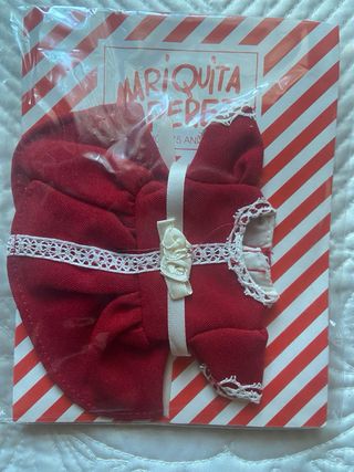 Muñeca Mariquita Pérez con 2 conjuntos