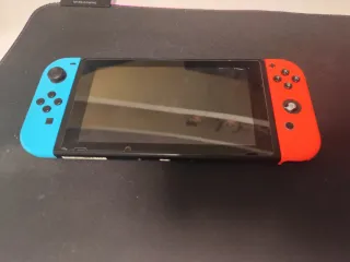 Pacchetto Nintendo Switch + Giochi + Custodia e altro