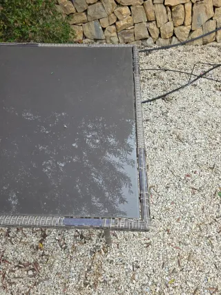 Mesa de exterior ratán y cristal