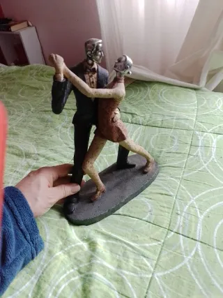 Figura de pareja bailando tango