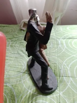 Figura de pareja bailando tango