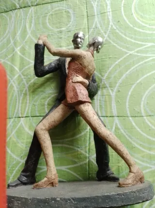 Figura de pareja bailando tango