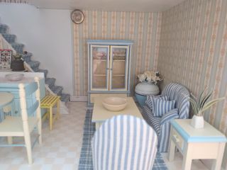 Casa de muñecas de madera