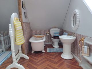 Casa de muñecas de madera