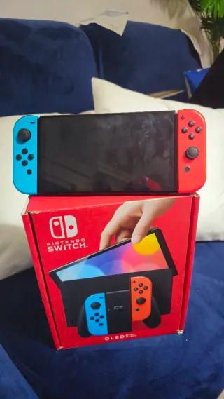 Nintendo Switch OLED Blu e Arancione