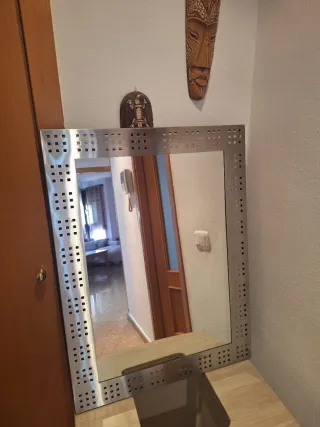 Mueble de baño con puerta de cristal