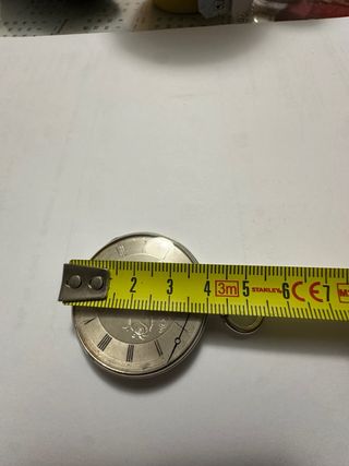 Reloj de bolsillo de plata funcionando