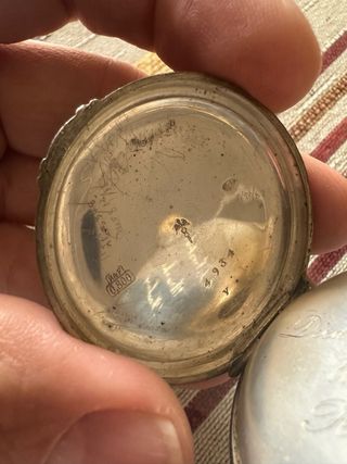 Reloj de bolsillo de plata firmado relojero