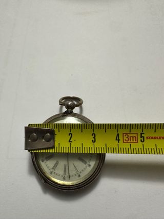 Reloj de bolsillo de plata antiguo