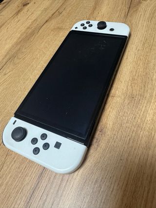 Nintendo Switch OLED – Console + dock + caricatore