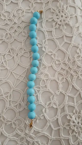 Bracciale donna con perle in impasto di turchese.