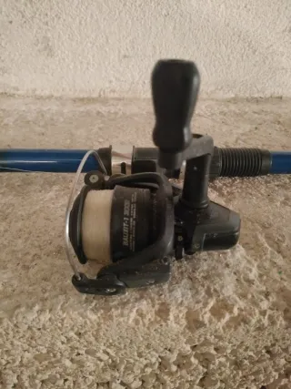Caña de pescar con carrete