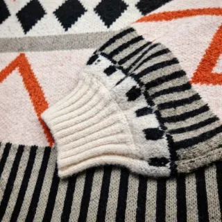 Jersey crop de lana geométrico cuello alto S/M