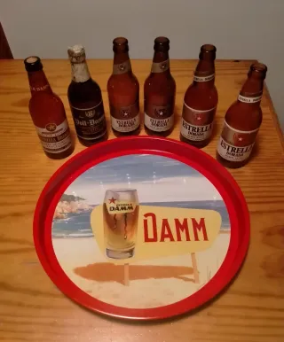 Pack Estrella Damm: Botellas, bandeja, cartel....