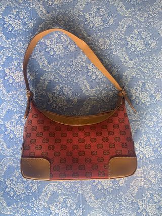 Borsa rossa Gucci con monogramma