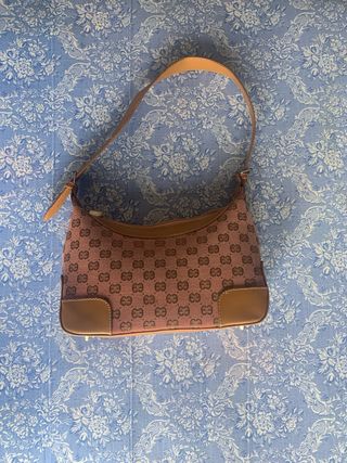 Borsa rossa Gucci con monogramma