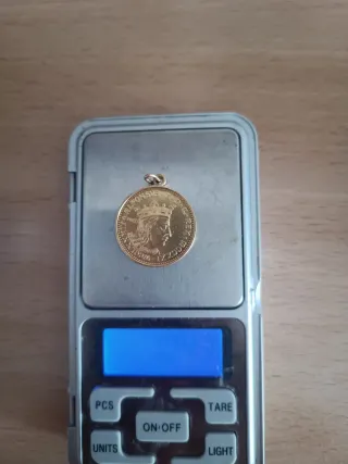 Moneda de oro 22k es negosiabil