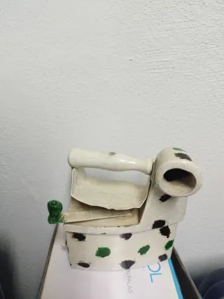 Plancha de carbón antigua decorada