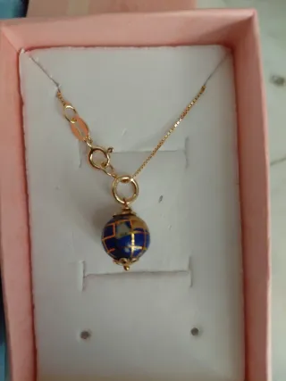 2 collane con ciondolo mappamondo