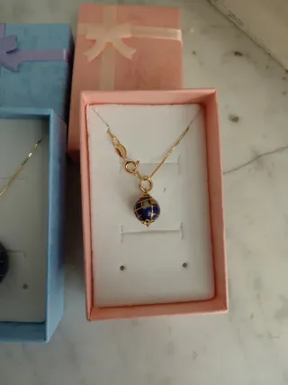 2 collane con ciondolo mappamondo