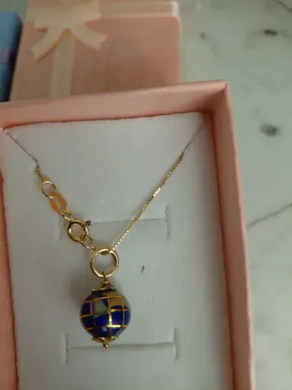 2 collane con ciondolo mappamondo