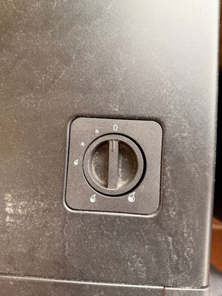 Calentador a gas con bombona y manguera