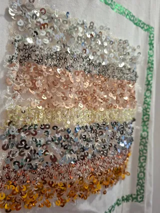 Camiseta blanca con lentejuelas talla L