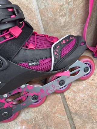 Patines rosas de oxelo con funda