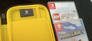 Nintendo Switch Lite Giallo + Custodia + 2 Giochi