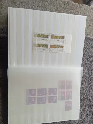 Lote sellos + álbum filatélico