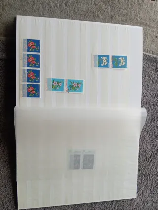 Lote sellos + álbum filatélico