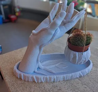 Mano porta vaso sospeso decorazione