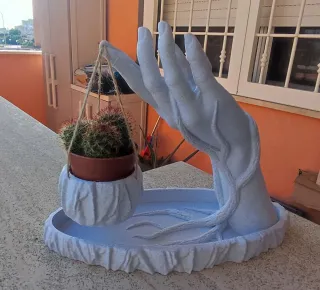 Mano porta vaso sospeso decorazione