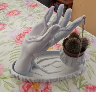 Mano porta vaso sospeso decorazione