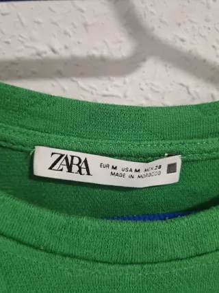 Vestido Zara verde con bolsillos figurados
