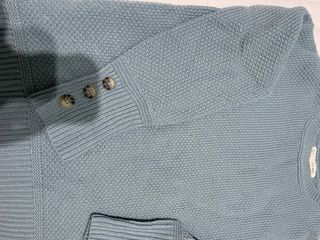 Jersey azul claro con botones