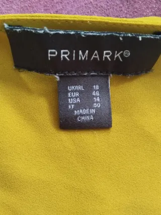 Camisa amarilla manga larga