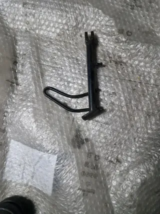 Pata lateral Kymco Superdink