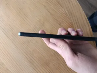 Teléfono Móvil Negro y Funda De Móvil Azul Marino