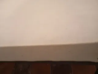 Somier de metal y madera con colchón