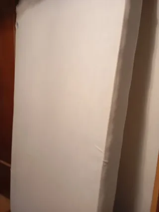 Somier de metal y madera con colchón