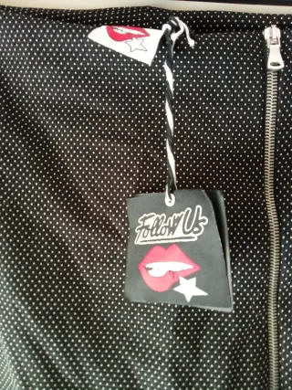 Minigonna nera con pois bianchi