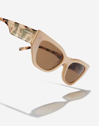 Gafas de sol beige y marrones
