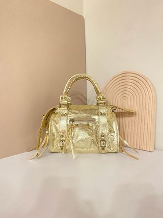 Bolso de mano de piel auténtica dorado 1502